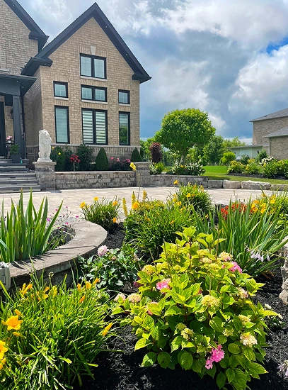 sunready landscaping elegant house nestled in a flourishing garden