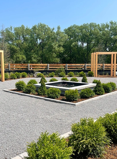 sunready landscaping gravel parking lot showcasing a fire pit